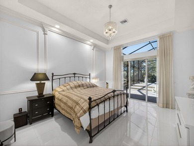 Tucked away on a rarely available, exceptionally private lot at on The Legacy Golf and Tennis Club in Florida - for sale on GolfHomes.com, golf home, golf lot