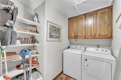 This home boasts a view like few others can perched high on a on Holiday Island Executive Golf Course in Arkansas - for sale on GolfHomes.com, golf home, golf lot