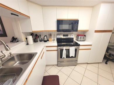 Charming Turnkey Condo with Stunning Championship Golf Course on Tara Golf and Country Club in Florida - for sale on GolfHomes.com, golf home, golf lot
