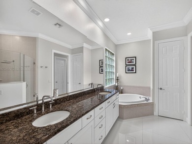 Tucked away on a rarely available, exceptionally private lot at on The Legacy Golf and Tennis Club in Florida - for sale on GolfHomes.com, golf home, golf lot