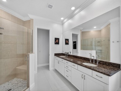 Tucked away on a rarely available, exceptionally private lot at on The Legacy Golf and Tennis Club in Florida - for sale on GolfHomes.com, golf home, golf lot