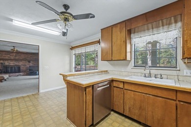 One or more photos has been virtually staged (office). Located on Killearn Country Club and Inn in Florida - for sale on GolfHomes.com, golf home, golf lot