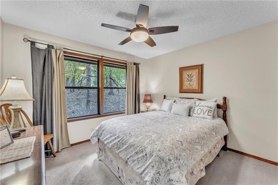 This home boasts a view like few others can perched high on a on Holiday Island Executive Golf Course in Arkansas - for sale on GolfHomes.com, golf home, golf lot