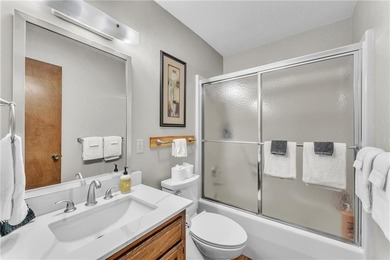 This home boasts a view like few others can perched high on a on Holiday Island Executive Golf Course in Arkansas - for sale on GolfHomes.com, golf home, golf lot