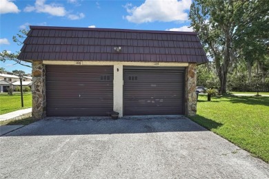 This charming pet-friendly 2-bedroom, 2-bathroom condo is a on Sugarmill Woods Golf and Country Club in Florida - for sale on GolfHomes.com, golf home, golf lot