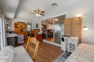 Beautifully renovated two bedroom/2 bath with enclosed bonus on Sun City Country Club in Arizona - for sale on GolfHomes.com, golf home, golf lot