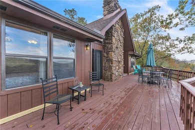 This home boasts a view like few others can perched high on a on Holiday Island Executive Golf Course in Arkansas - for sale on GolfHomes.com, golf home, golf lot