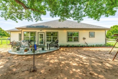 Beautifully set along the greens of the Par Golf Course, this on P.A.R. Country Club in Texas - for sale on GolfHomes.com, golf home, golf lot