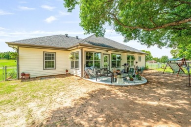 Beautifully set along the greens of the Par Golf Course, this on P.A.R. Country Club in Texas - for sale on GolfHomes.com, golf home, golf lot