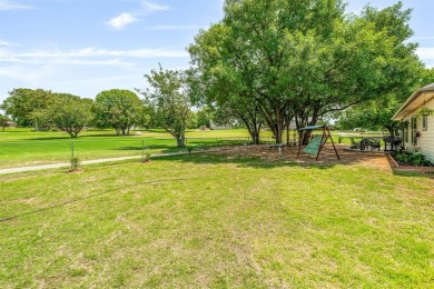 Beautifully set along the greens of the Par Golf Course, this on P.A.R. Country Club in Texas - for sale on GolfHomes.com, golf home, golf lot