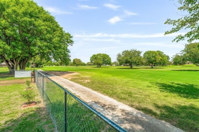 Beautifully set along the greens of the Par Golf Course, this on P.A.R. Country Club in Texas - for sale on GolfHomes.com, golf home, golf lot