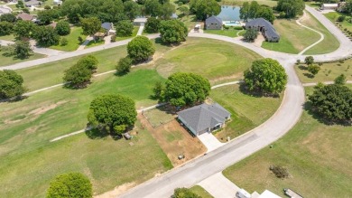 Beautifully set along the greens of the Par Golf Course, this on P.A.R. Country Club in Texas - for sale on GolfHomes.com, golf home, golf lot