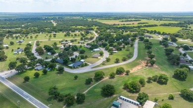 Beautifully set along the greens of the Par Golf Course, this on P.A.R. Country Club in Texas - for sale on GolfHomes.com, golf home, golf lot