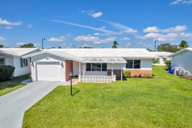 2BR/2BA WITH GARAGE! BRAND NEW ROOF & FLAT ROOF DEC 2023 with a on Leisureville Community Association in Florida - for sale on GolfHomes.com, golf home, golf lot