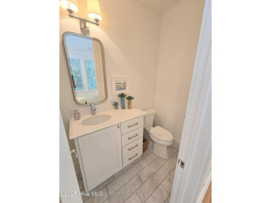 Nestled in the serene maritime forest overlooking the 11th on Bald Head Island Golf Club in North Carolina - for sale on GolfHomes.com, golf home, golf lot