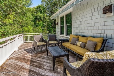 Nestled in the serene maritime forest overlooking the 11th on Bald Head Island Golf Club in North Carolina - for sale on GolfHomes.com, golf home, golf lot