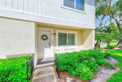 Welcome to this bright and inviting 2 bedroom, 1.5 bath, ground on Cove Cay Country Club in Florida - for sale on GolfHomes.com, golf home, golf lot