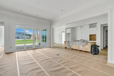 Discover refined coastal living in this stunning Hampton plan by on Origins Golf Club in Florida - for sale on GolfHomes.com, golf home, golf lot