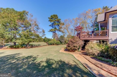 Welcome to this beautifully maintained Frank Betz designed ranch on The Providence Club in Georgia - for sale on GolfHomes.com, golf home, golf lot