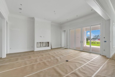 Discover refined coastal living in this stunning Hampton plan by on Origins Golf Club in Florida - for sale on GolfHomes.com, golf home, golf lot