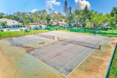 Welcome to this bright and inviting 2 bedroom, 1.5 bath, ground on Cove Cay Country Club in Florida - for sale on GolfHomes.com, golf home, golf lot