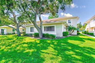 Welcome to this bright and inviting 2 bedroom, 1.5 bath, ground on Cove Cay Country Club in Florida - for sale on GolfHomes.com, golf home, golf lot