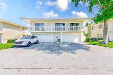Welcome to this bright and inviting 2 bedroom, 1.5 bath, ground on Cove Cay Country Club in Florida - for sale on GolfHomes.com, golf home, golf lot