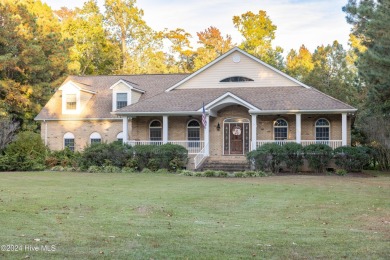 This stunning custom-built 4-bedroom, 3.5-bath home is set on a on Sound Golf Links at Albemarle Plantation in North Carolina - for sale on GolfHomes.com, golf home, golf lot