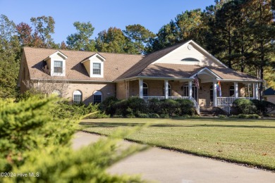 This stunning custom-built 4-bedroom, 3.5-bath home is set on a on Sound Golf Links at Albemarle Plantation in North Carolina - for sale on GolfHomes.com, golf home, golf lot