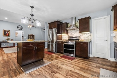 Welcome to your dream full-time residence in the heart of Four on Tan-Tar-A Golf Club in Missouri - for sale on GolfHomes.com, golf home, golf lot