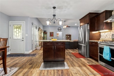 Welcome to your dream full-time residence in the heart of Four on Tan-Tar-A Golf Club in Missouri - for sale on GolfHomes.com, golf home, golf lot