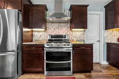 Welcome to your dream full-time residence in the heart of Four on Tan-Tar-A Golf Club in Missouri - for sale on GolfHomes.com, golf home, golf lot