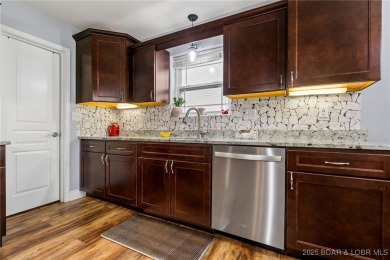 Welcome to your dream full-time residence in the heart of Four on Tan-Tar-A Golf Club in Missouri - for sale on GolfHomes.com, golf home, golf lot