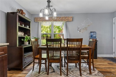 Welcome to your dream full-time residence in the heart of Four on Tan-Tar-A Golf Club in Missouri - for sale on GolfHomes.com, golf home, golf lot