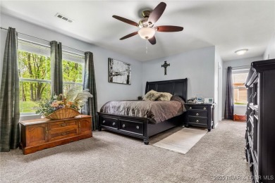Welcome to your dream full-time residence in the heart of Four on Tan-Tar-A Golf Club in Missouri - for sale on GolfHomes.com, golf home, golf lot