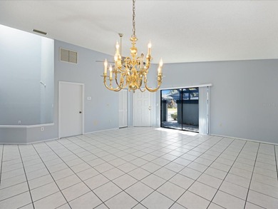 Located in the desirable 24-hour guard-gated community of East on East Lake Woodlands Country Club in Florida - for sale on GolfHomes.com, golf home, golf lot