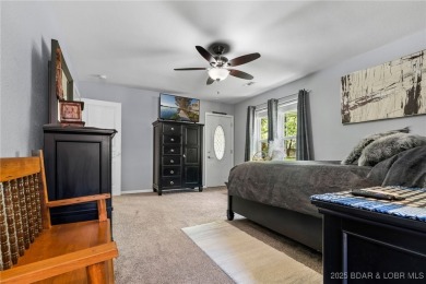 Welcome to your dream full-time residence in the heart of Four on Tan-Tar-A Golf Club in Missouri - for sale on GolfHomes.com, golf home, golf lot