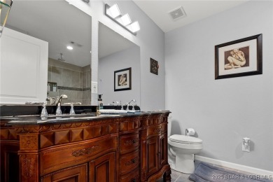 Welcome to your dream full-time residence in the heart of Four on Tan-Tar-A Golf Club in Missouri - for sale on GolfHomes.com, golf home, golf lot