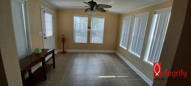 Come settle down and relax in a beautiful manufactured home with on Fairways Country Club in Florida - for sale on GolfHomes.com, golf home, golf lot