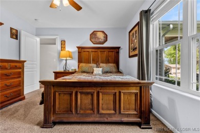 Welcome to your dream full-time residence in the heart of Four on Tan-Tar-A Golf Club in Missouri - for sale on GolfHomes.com, golf home, golf lot
