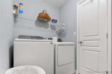 Welcome to your dream full-time residence in the heart of Four on Tan-Tar-A Golf Club in Missouri - for sale on GolfHomes.com, golf home, golf lot