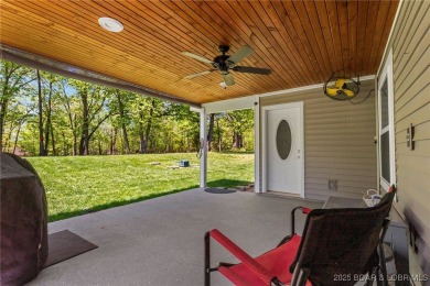 Welcome to your dream full-time residence in the heart of Four on Tan-Tar-A Golf Club in Missouri - for sale on GolfHomes.com, golf home, golf lot