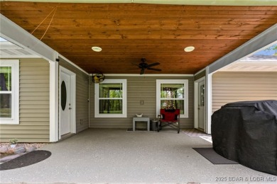 Welcome to your dream full-time residence in the heart of Four on Tan-Tar-A Golf Club in Missouri - for sale on GolfHomes.com, golf home, golf lot