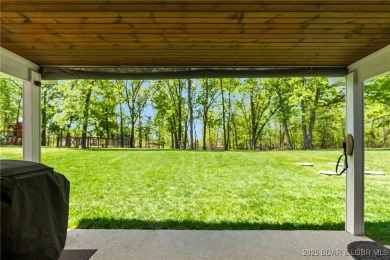 Welcome to your dream full-time residence in the heart of Four on Tan-Tar-A Golf Club in Missouri - for sale on GolfHomes.com, golf home, golf lot