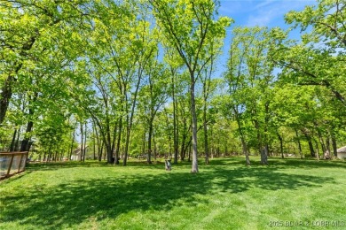 Welcome to your dream full-time residence in the heart of Four on Tan-Tar-A Golf Club in Missouri - for sale on GolfHomes.com, golf home, golf lot