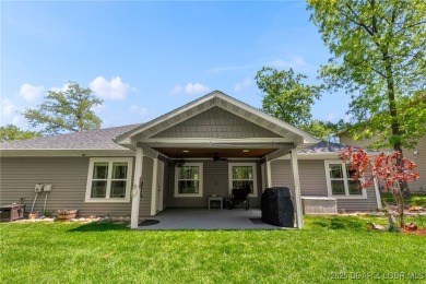 Welcome to your dream full-time residence in the heart of Four on Tan-Tar-A Golf Club in Missouri - for sale on GolfHomes.com, golf home, golf lot