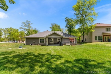 Welcome to your dream full-time residence in the heart of Four on Tan-Tar-A Golf Club in Missouri - for sale on GolfHomes.com, golf home, golf lot
