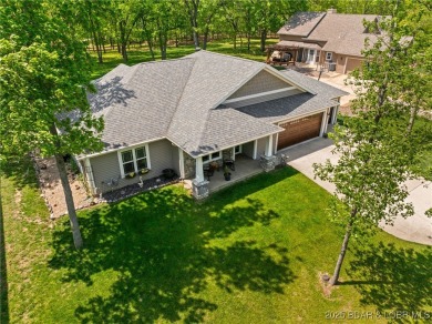 Welcome to your dream full-time residence in the heart of Four on Tan-Tar-A Golf Club in Missouri - for sale on GolfHomes.com, golf home, golf lot