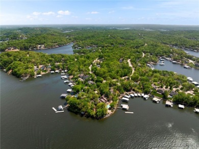 Welcome to your dream full-time residence in the heart of Four on Tan-Tar-A Golf Club in Missouri - for sale on GolfHomes.com, golf home, golf lot