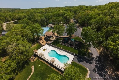 Welcome to your dream full-time residence in the heart of Four on Tan-Tar-A Golf Club in Missouri - for sale on GolfHomes.com, golf home, golf lot